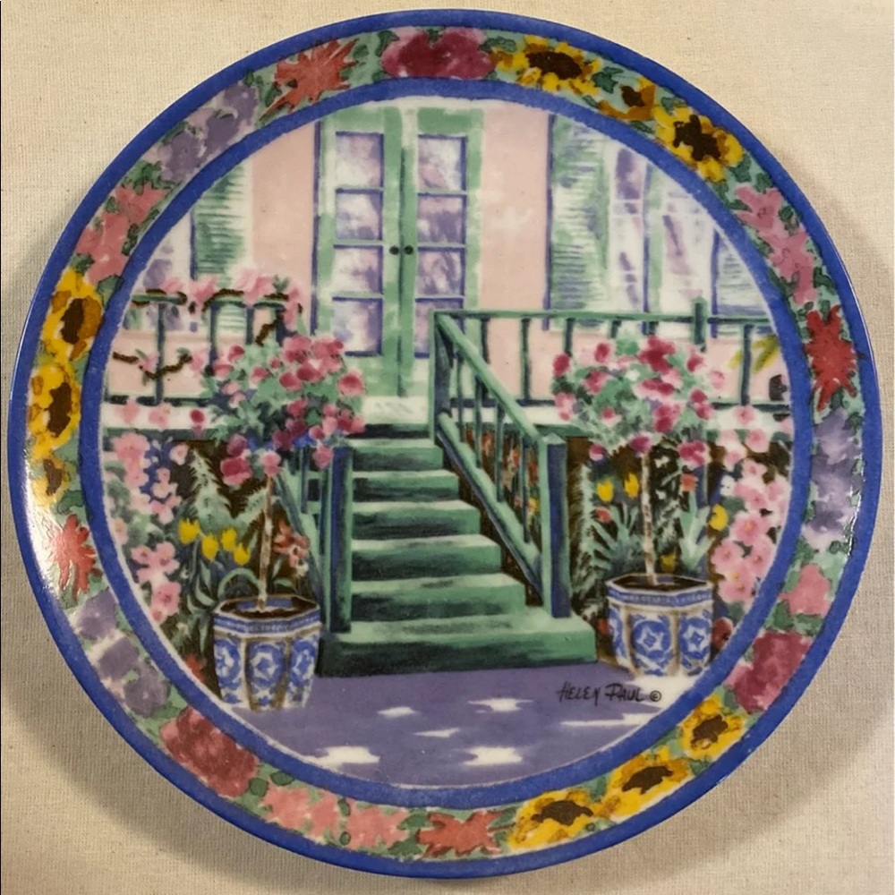 Set of 3 Helen Paul decorative plates.